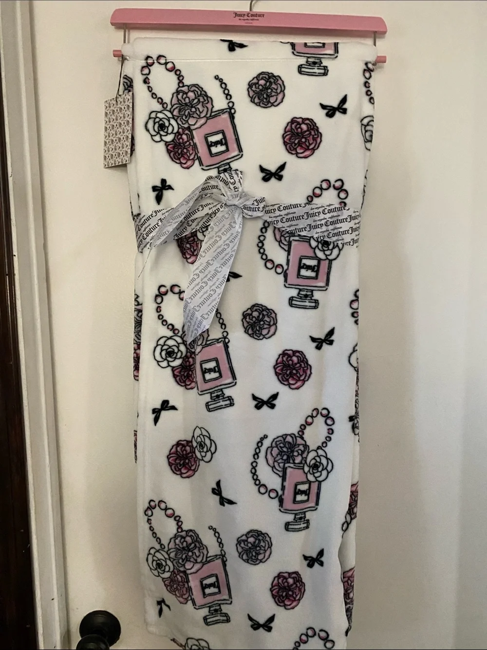 Juicy Couture White Plush Throw with Pink Perfume Bottle and Black Accents
